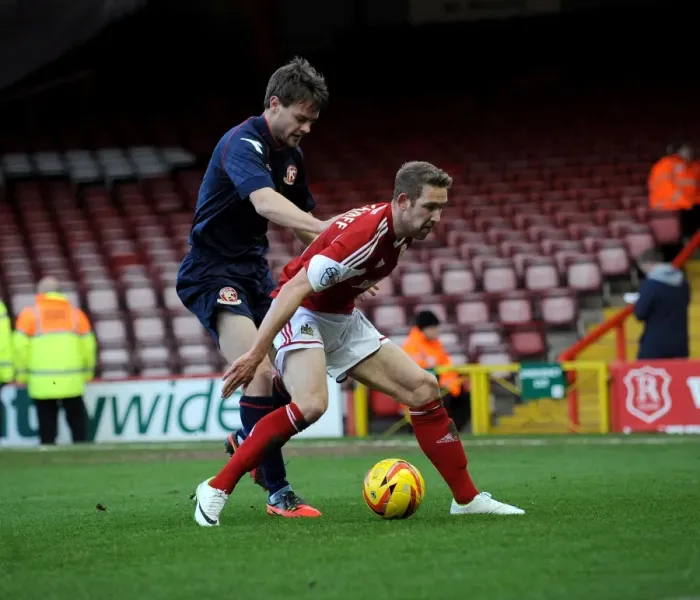 Framed Print : Bristol City's Scott Wagstaff Fends Off Walsall's Andy Taylor in Sky Bet League One Clash at Ashton Gate Framed Print : Bristol City's Scott Wagstaff Fends Off Walsall's Andy Taylor in Sky Bet League One Clash at Ashton Gate