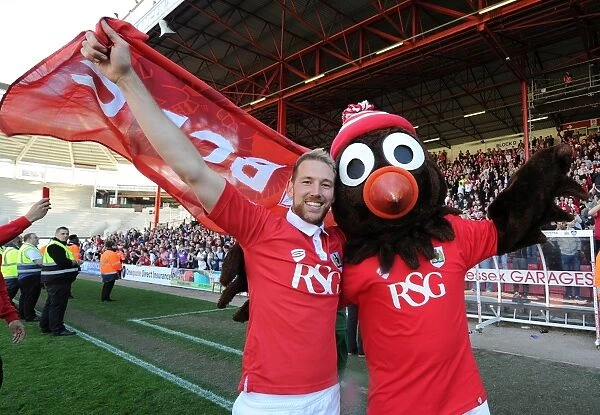 Bristol City's Scott Wagstaff and Scrumpy the Robin Celebrate Goal against Coventry City, April 2015
