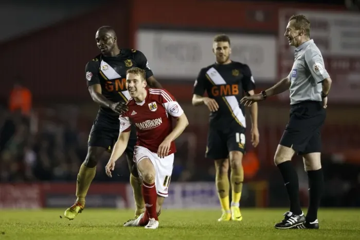 Framed Print : Bristol City's Scott Wagstaff Smiles After Foul by Port Vale's Anthony Griffith during Sky Bet League One Match Framed Print : Bristol City's Scott Wagstaff Smiles After Foul by Port Vale's Anthony Griffith during Sky Bet League One Match