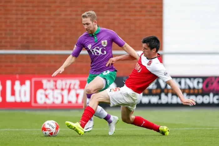 Framed Print : Bristol City's Scott Wagstaff Tackled by Fleetwood's Stephen Jordan during Fleetwood Town vs. Bristol City, Sky Bet League 1, 2014