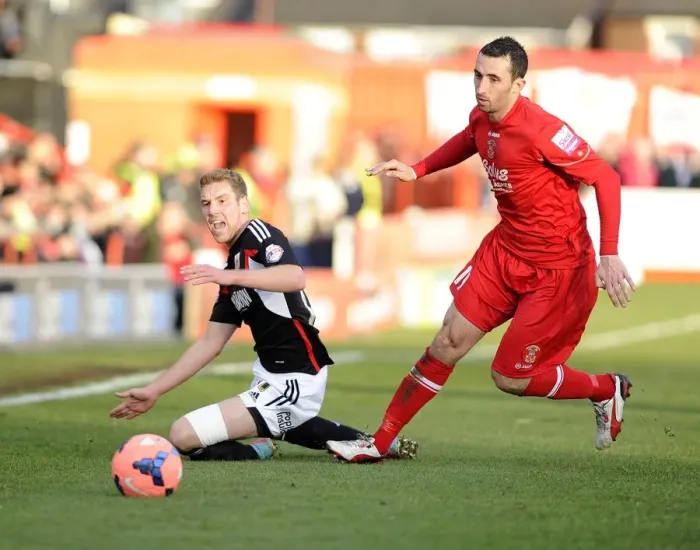 Framed Print : Bristol City's Scott Wagstaff Tackled by Tamworth's Tony Capaldi during FA Cup Match Framed Print : Bristol City's Scott Wagstaff Tackled by Tamworth's Tony Capaldi during FA Cup Match