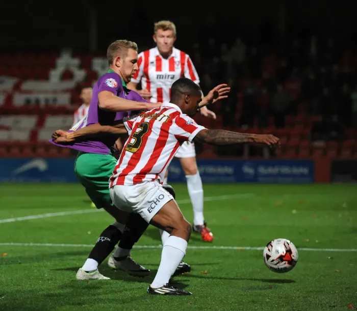 Framed Print : Bristol City's Scott Wagstaff vs Cheltenham Town's Craig Braham-Barrett - Intense Football Rivalry