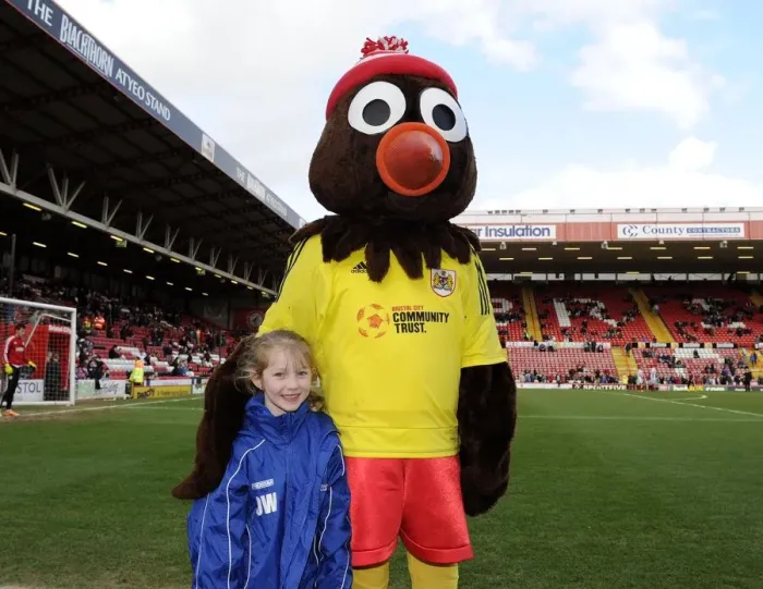 Framed Print : Bristol City's Scrumpy the Mascot Delights Young Fans at Ashton Gate during Bristol City v Gillingham Match, March 2014 Framed Print : Bristol City's Scrumpy the Mascot Delights Young Fans at Ashton Gate during Bristol City v Gillingham Match, March 2014
