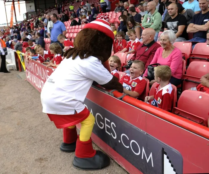 Framed Print : Bristol City's Scrumpy Mascot Interacts with Fans at Ashton Gate during Bristol City vs Doncaster Rovers Match, Sky Bet League One