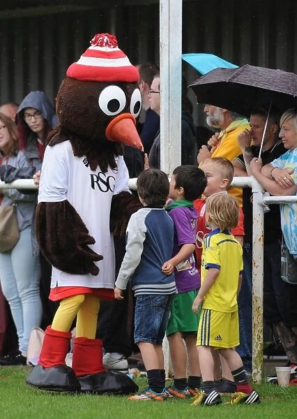 Bristol City's Scrumpy the Robin Engages with Young Fans during Pre-Season Friendly at Brislington Stadium (July 2015)