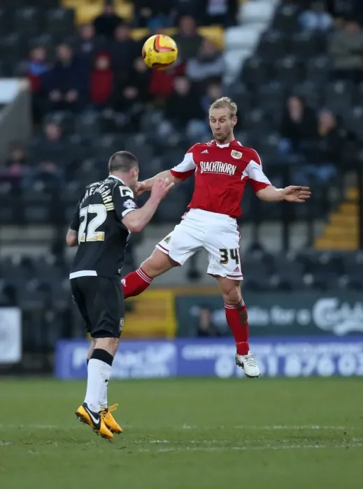 Framed Print : Bristol City's Simon Gillett Clears the Ball Against Notts County, Sky Bet League One, December 2013
