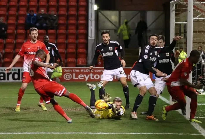 Framed Print : Bristol City's Simon Moore Saves from Leyton Orient's Kevin Lisbie in Sky Bet League One Clash Framed Print : Bristol City's Simon Moore Saves from Leyton Orient's Kevin Lisbie in Sky Bet League One Clash