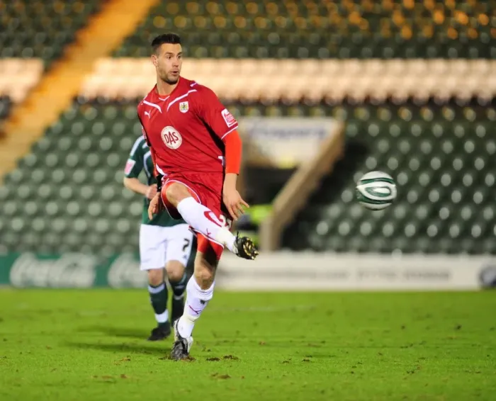 Framed Print : Bristol City's Stefan Maierhofer Fights for Possession against Plymouth Argyle in Championship Match, March 16, 2010