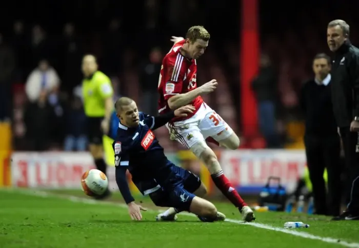 Framed Print : Bristol City's Stephen Pearson Dodges Alan Dunne's Tackle in Championship Clash between Bristol City and Millwall - 03 / 01 / 2012 Framed Print : Bristol City's Stephen Pearson Dodges Alan Dunne's Tackle in Championship Clash between Bristol City and Millwall - 03 / 01 / 2012