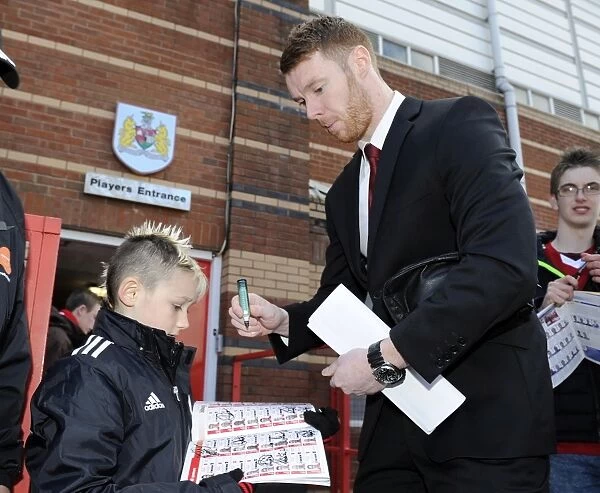 Bristol City's Stephen Pearson Greets Young Fan with Autograph at Ashton Gate, 2014