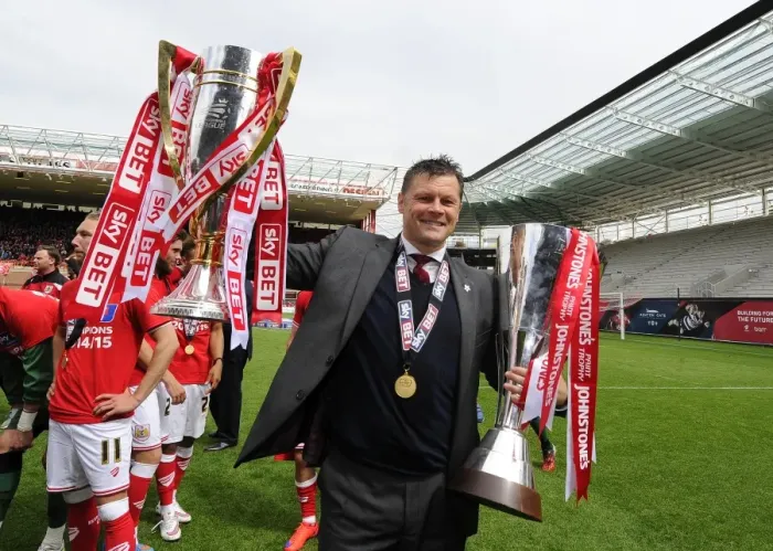 Framed Print : Bristol City's Steve Cotterill Hoists League One and JPT Trophies After Victory Over Walsall