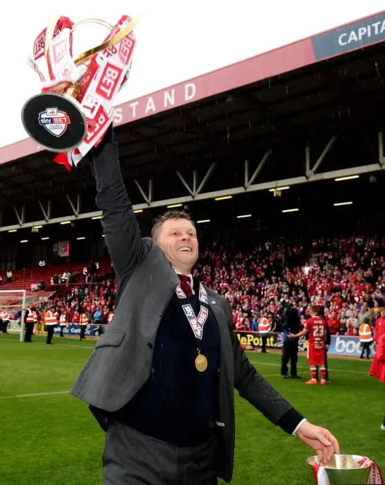 Framed Print : Bristol City's Steve Cotterill Lifts Sky Bet League One and JPT Trophies after Victory over Walsall
