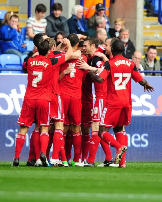 Framed Print : Bristol City's Steven Davies Celebrates Goal with Team Mates in Championship Match against Bolton Wanderers Framed Print : Bristol City's Steven Davies Celebrates Goal with Team Mates in Championship Match against Bolton Wanderers