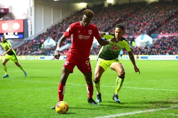 Framed Print : Bristol City's Tammy Abraham Fends Off Reading's Liam Moore in Championship Clash