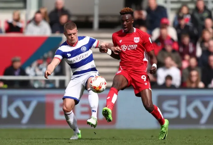 Framed Print : Bristol City's Tammy Abraham Slips Past QPR's Jake Bidwell in Championship Clash