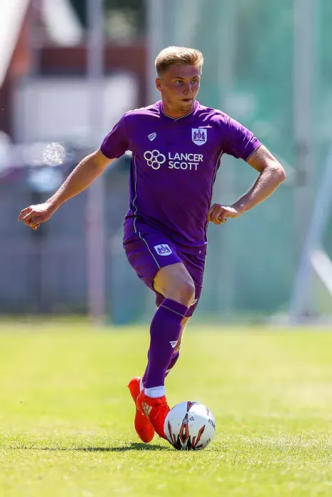 Framed Print : Bristol City's Taylor Moore in Action during Pre-season Friendly against Guernsey FC Framed Print : Bristol City's Taylor Moore in Action during Pre-season Friendly against Guernsey FC