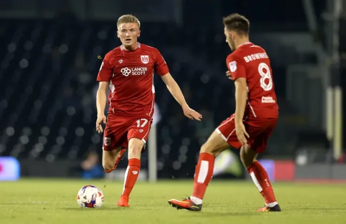 Framed Print : Bristol City's Taylor Moore Charges Forward Against Fulham in EFL Cup Clash