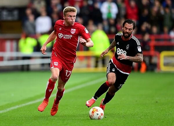 Bristol City's Taylor Moore Drives Forward Against Nottingham Forest in Sky Bet Championship Match
