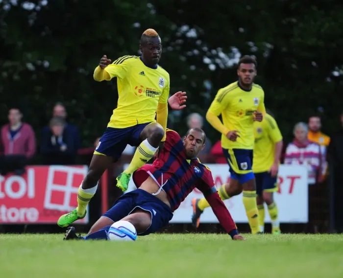Framed Print : Bristol City's Toby Ajala Skips Past an Opponent in Pre-Season Friendly Against Ashton and Backwell United Framed Print : Bristol City's Toby Ajala Skips Past an Opponent in Pre-Season Friendly Against Ashton and Backwell United