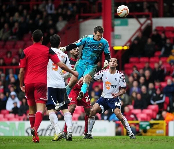 Bristol City's Tom Heaton Goes for Glory: A Thrilling Moment from the Npower Championship Clash vs. Bolton Wanderers (13 / 04 / 2013)