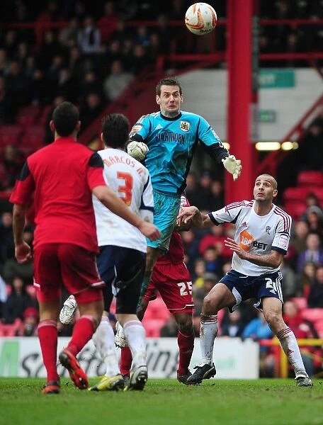 Bristol City's Tom Heaton Soaring for the Goal: A Thrilling Moment from the Bristol City vs. Bolton Wanderers Npower Championship Match, April 2013