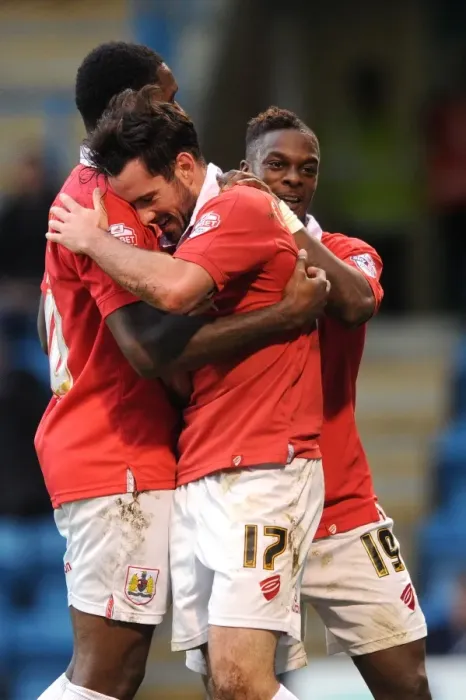 Framed Print : Bristol City's Triumph: Cunningham, Emmanuel-Thomas, and Agard Celebrate Goal in FA Cup Match against Gillingham Framed Print : Bristol City's Triumph: Cunningham, Emmanuel-Thomas, and Agard Celebrate Goal in FA Cup Match against Gillingham