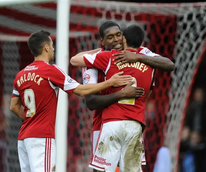 Framed Print : Bristol City's Triumph: Emmanuel-Thomas, Moloney, and Baldock's Euphoric Moment after FA Cup Goal vs. Dagenham and Redbridge Framed Print : Bristol City's Triumph: Emmanuel-Thomas, Moloney, and Baldock's Euphoric Moment after FA Cup Goal vs. Dagenham and Redbridge