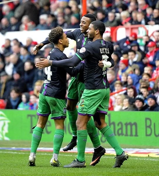 Bristol City's Triumph: Kodjia, Reid, and Little Celebrate Goal Against Nottingham Forest (February 2016)
