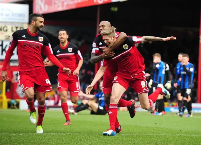 Framed Print : Bristol City's Triumph: Stead, Elliott, and Liam Fontaine Celebrate Npower Championship Win Against Barnsley
