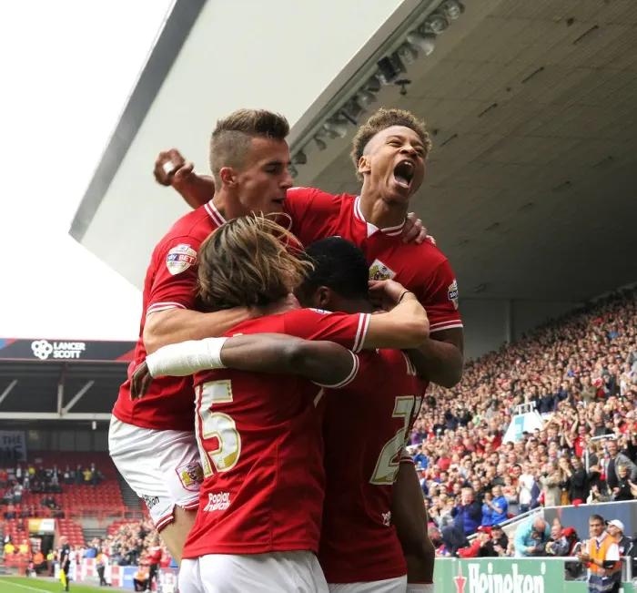 Framed Print : Bristol City's Unstoppable Goal Scoring Quartet: Kodjia, Reid, Freeman, Bryan Celebrate in Sky Bet Championship Victory