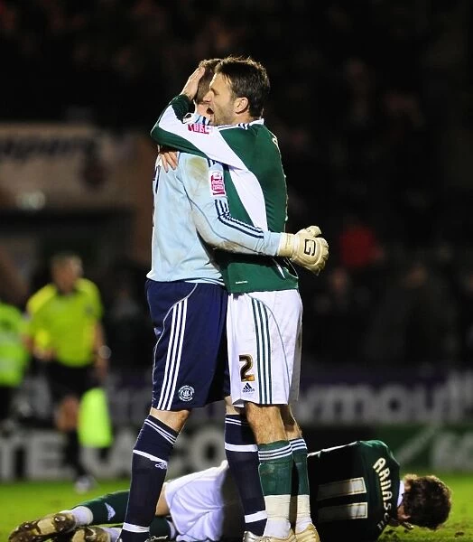 Bristol City's Victory: Duguid and Stockdale Celebrate in Plymouth Argyle's Home Park, Championship 2010