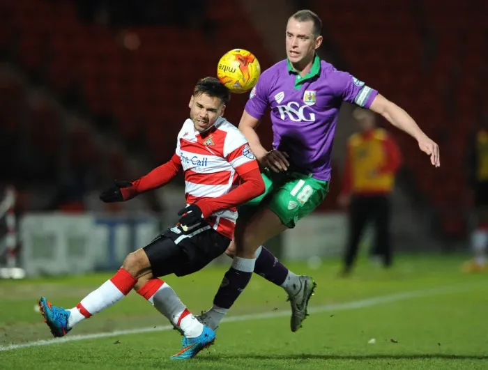 Framed Print : Bristol City's Wilbraham Closes In on Forrester in Doncaster Showdown Framed Print : Bristol City's Wilbraham Closes In on Forrester in Doncaster Showdown