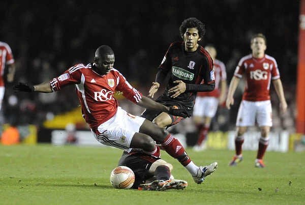 Bristol City's Yannick Bolasie Fouled by Scott McDonald in Bristol City v Middlesbrough Match, December 2011