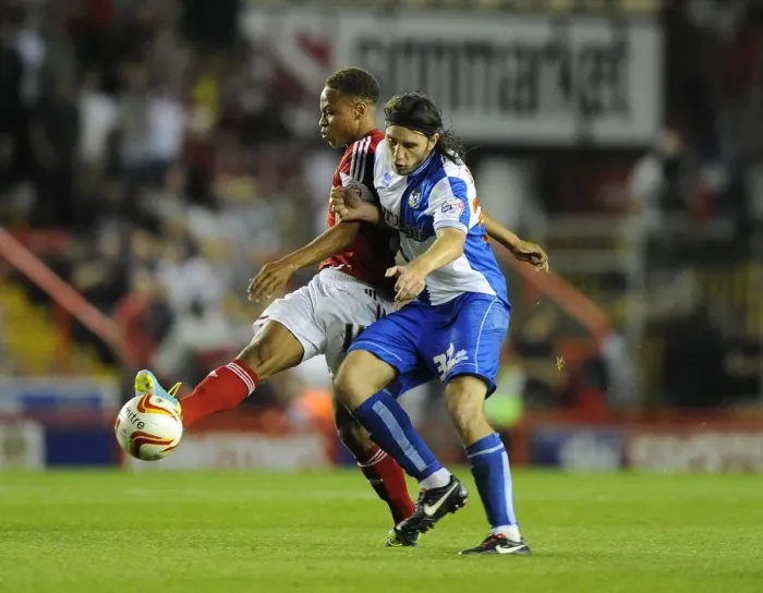 Framed Print : Bristol Derby: Bobby Reid vs John-Joe O'Toole Clash in Bristol City V Bristol Rovers Johnstone's Paint Trophy Match