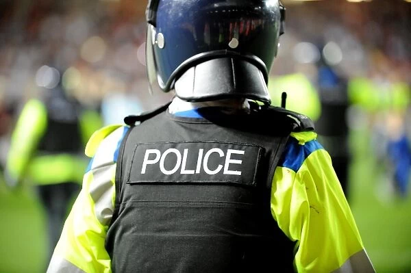 Bristol Derby Clash: Police Intervene as Fans Invade Pitch in Johnstone Paint Trophy Match (Bristol City V Bristol Rovers)