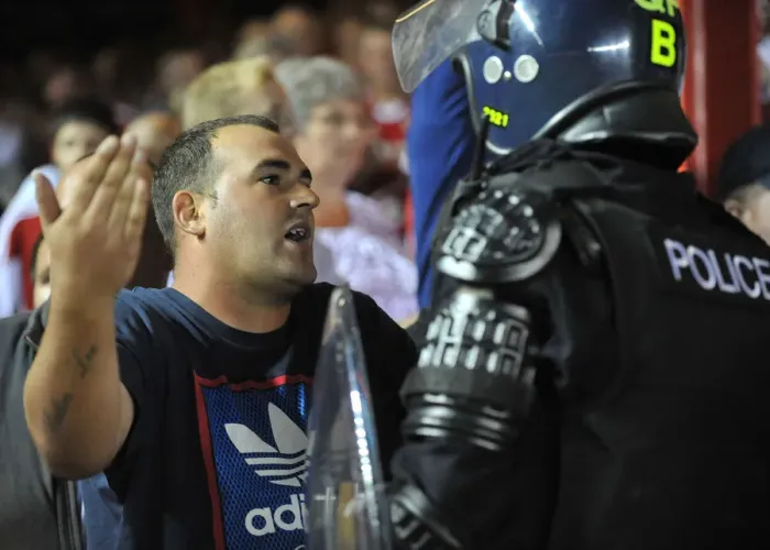 Framed Print : Bristol Derby: Fan Faces Police Confrontation at Ashton Gate (Bristol City V Bristol Rovers, Johnstone Paint Trophy 2013) Framed Print : Bristol Derby: Fan Faces Police Confrontation at Ashton Gate (Bristol City V Bristol Rovers, Johnstone Paint Trophy 2013)