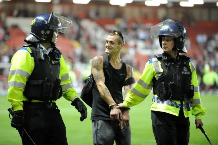 Framed Print : Bristol Derby: Fan Removed by Riot Police at Ashton Gate (Johnstone Paint Trophy First Round) Framed Print : Bristol Derby: Fan Removed by Riot Police at Ashton Gate (Johnstone Paint Trophy First Round)