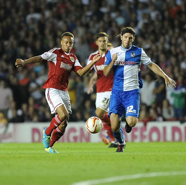 Bristol Derby: Intense Moment as Bobby Reid Chases Down John-Joe O'Toole in the First Round of Johnstone's Paint Trophy (Bristol City vs. Bristol Rovers, September 4, 2013)