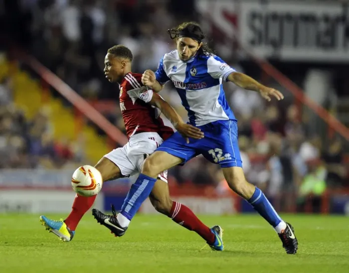 Framed Print : Bristol Derby Showdown: Bobby Reid vs John-Joe O'Toole in Intense Football Rivalry