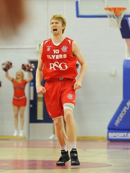 Bristol Flyers Celebrate Thrilling Victory Over Surrey United in Basketball