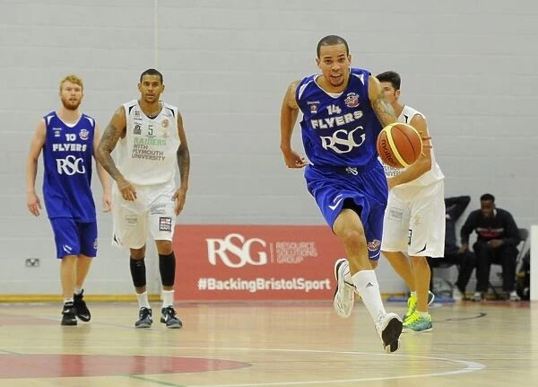 Bristol Flyers Doug McLaughlin-Williams Charges Forward Against Plymouth Raiders in Basketball Action