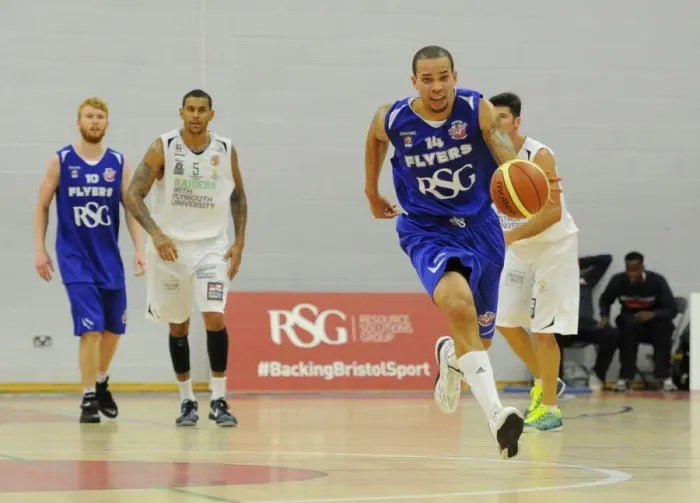 Framed Print : Bristol Flyers Doug McLaughlin-Williams Charges Forward Against Plymouth Raiders in Basketball Action