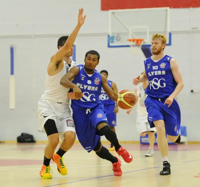 Framed Print : Bristol Flyers Dwayne Lautier-Ogunleye Charges Forward in Basketball Action Framed Print : Bristol Flyers Dwayne Lautier-Ogunleye Charges Forward in Basketball Action