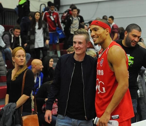 Bristol Flyers Greg Streete Celebrates with Fans after Victory over Cheshire Phoenix