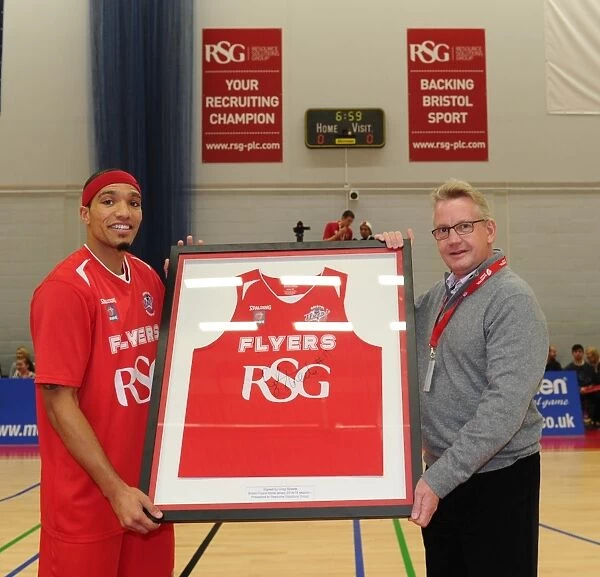 Bristol Flyers Greg Streete Honors Opponent with Shirt Presentation during Basketball Game vs. Surrey United (2014)