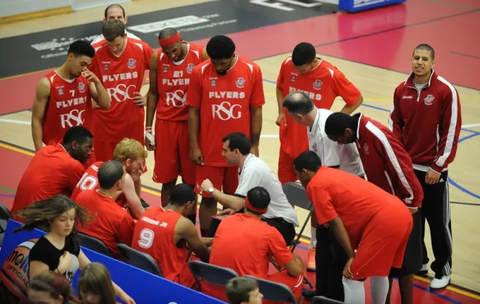Framed Print : Bristol Flyers Head Coach Andreas Kapoulas Delivers Team Talk During Basketball Match vs. Durham Wildcats