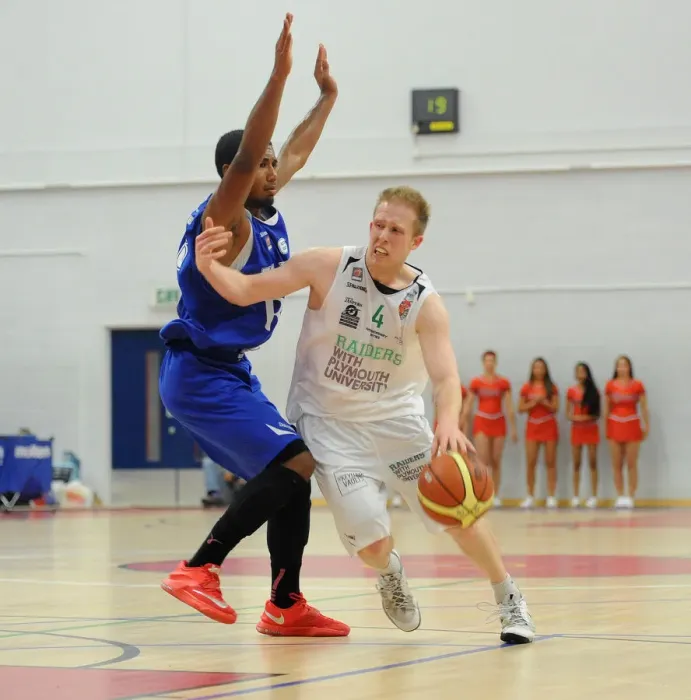 Framed Print : Bristol Flyers: Intense Showdown between Lautier-Ogunleye and Wilcher