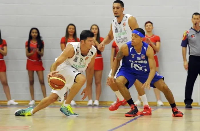 Framed Print : Bristol Rivalry: Flyers vs. Raiders Clash in Basketball Action at SGS Wise Campus - September 2014