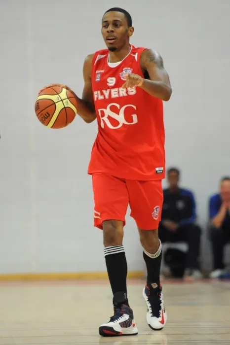 Framed Print : British Basketball Cup: Flyers vs. Raiders - A High-Stakes Showdown