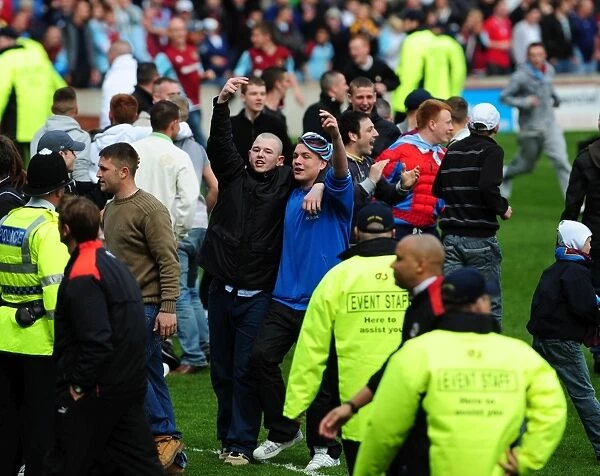 Burnley Fans Invade the Pitch: A Moment from the Burnley vs. Bristol City Match